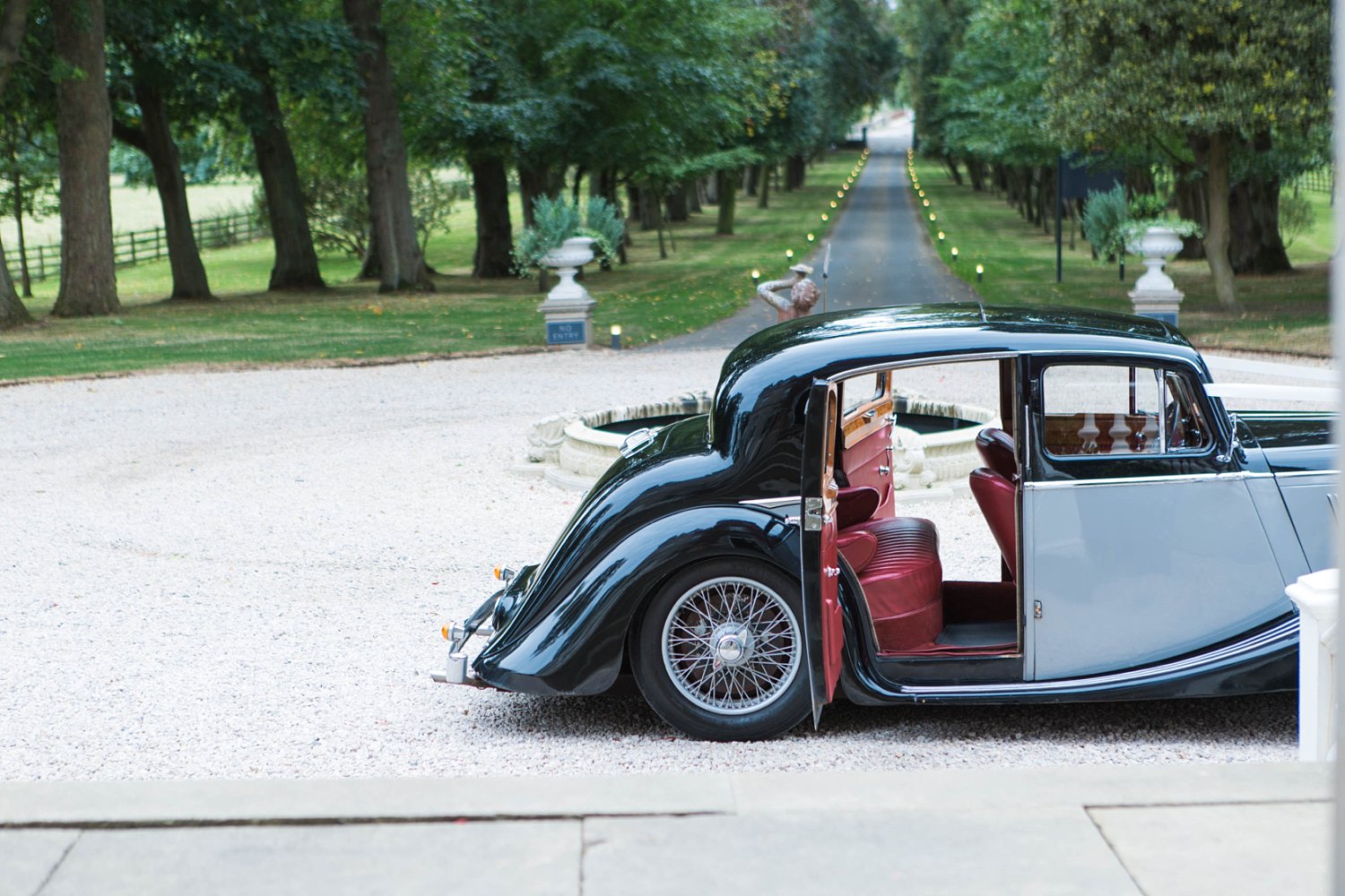 Vintage Jaguar Wedding Car at Carlowrie Castle in Edinburgh photo