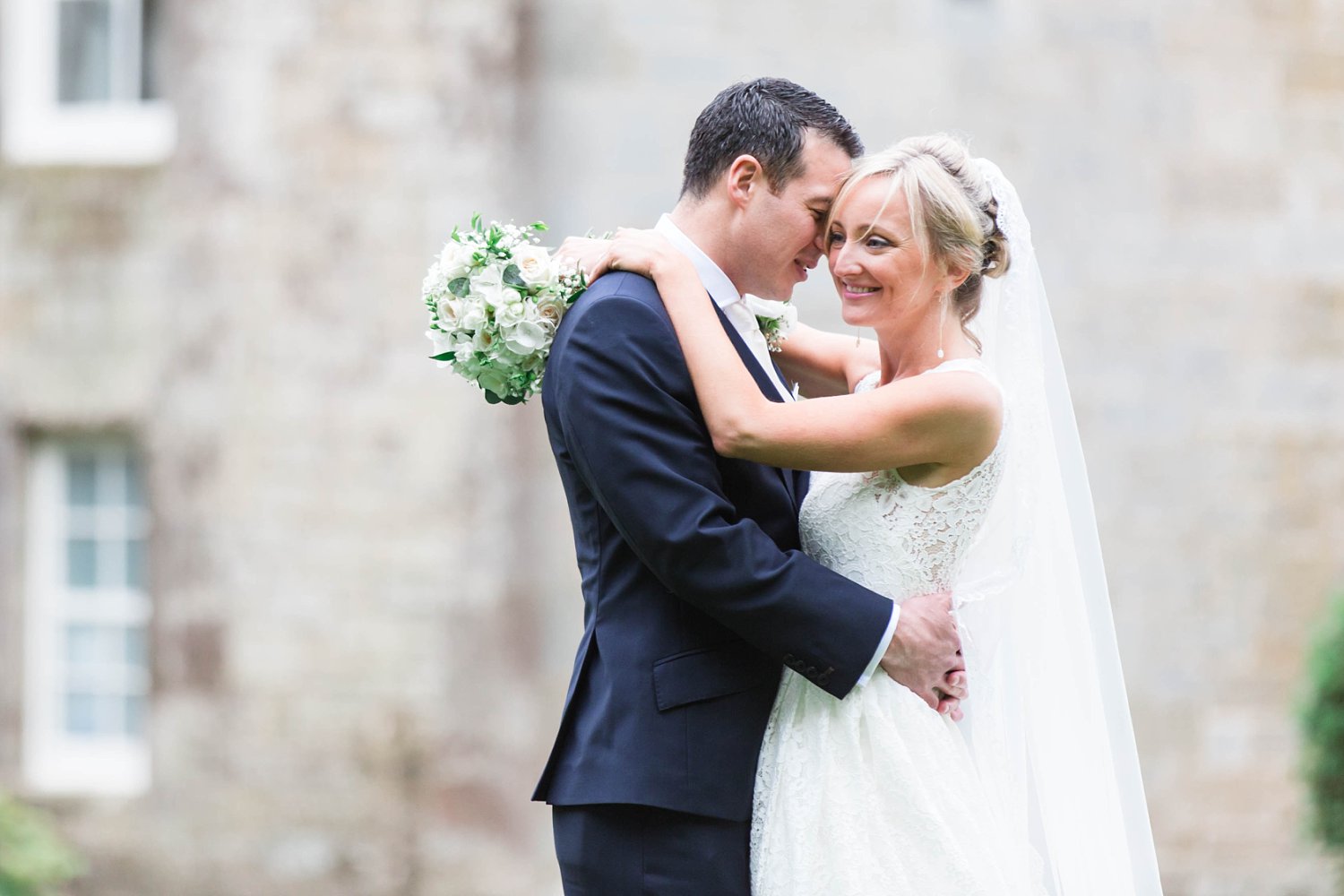 Bride and groom portraits at a luxury castle wedding in Scotland. Fine art wedding photography in the UK.